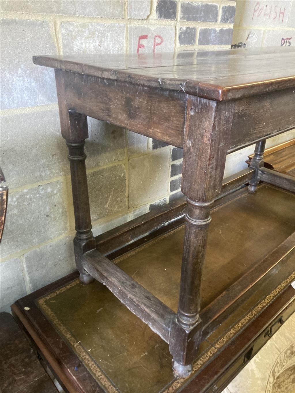 An 18th century oak side table, fitted with a drawer, width 121cm, depth 57cm, height 74cm